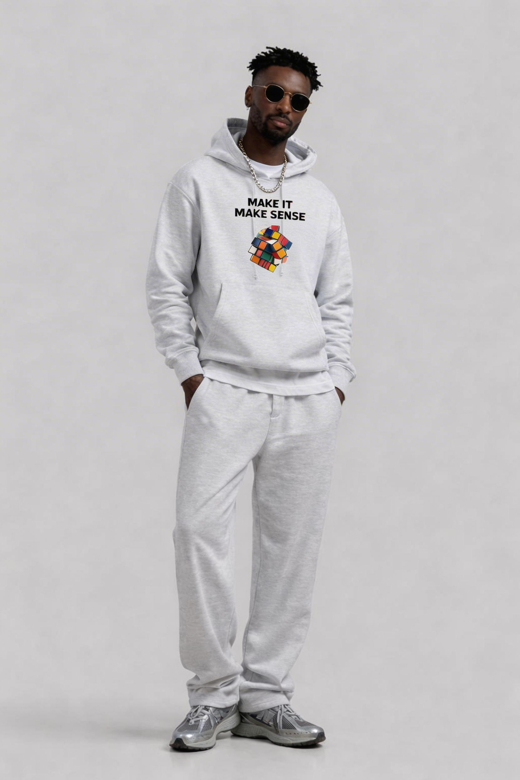 male model standing front view wearing oversized light grey hoodie make it make sense graphic rubik cube streetwear outfit