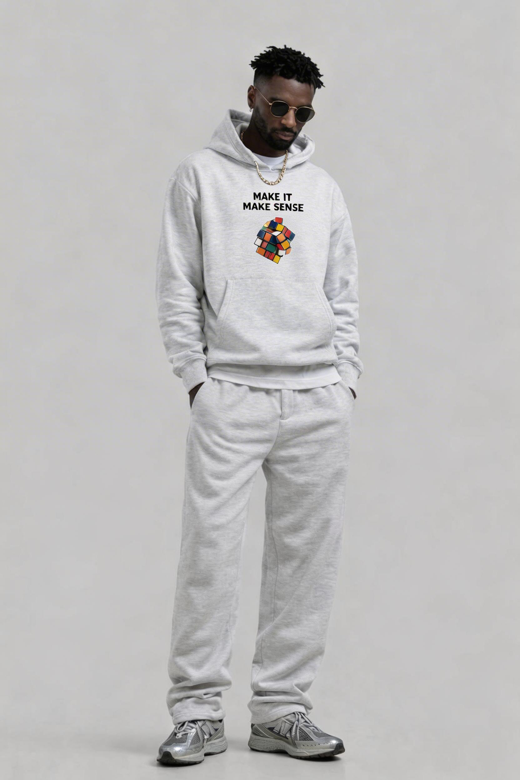 male model relaxed pose wearing grey oversized hoodie with colorful cube print urban streetwear fashion