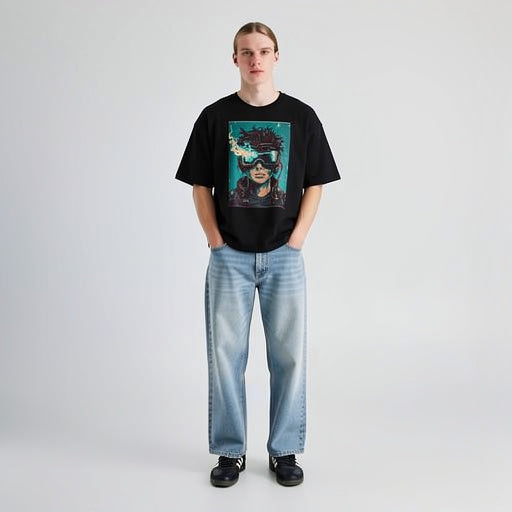 Full body model wearing black unisex graphic t-shirt with illustrated portrait, contemporary streetwear look