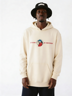 Male model modeling beige oversized graphic hoodie with minimal chest print, relaxed urban fashion style