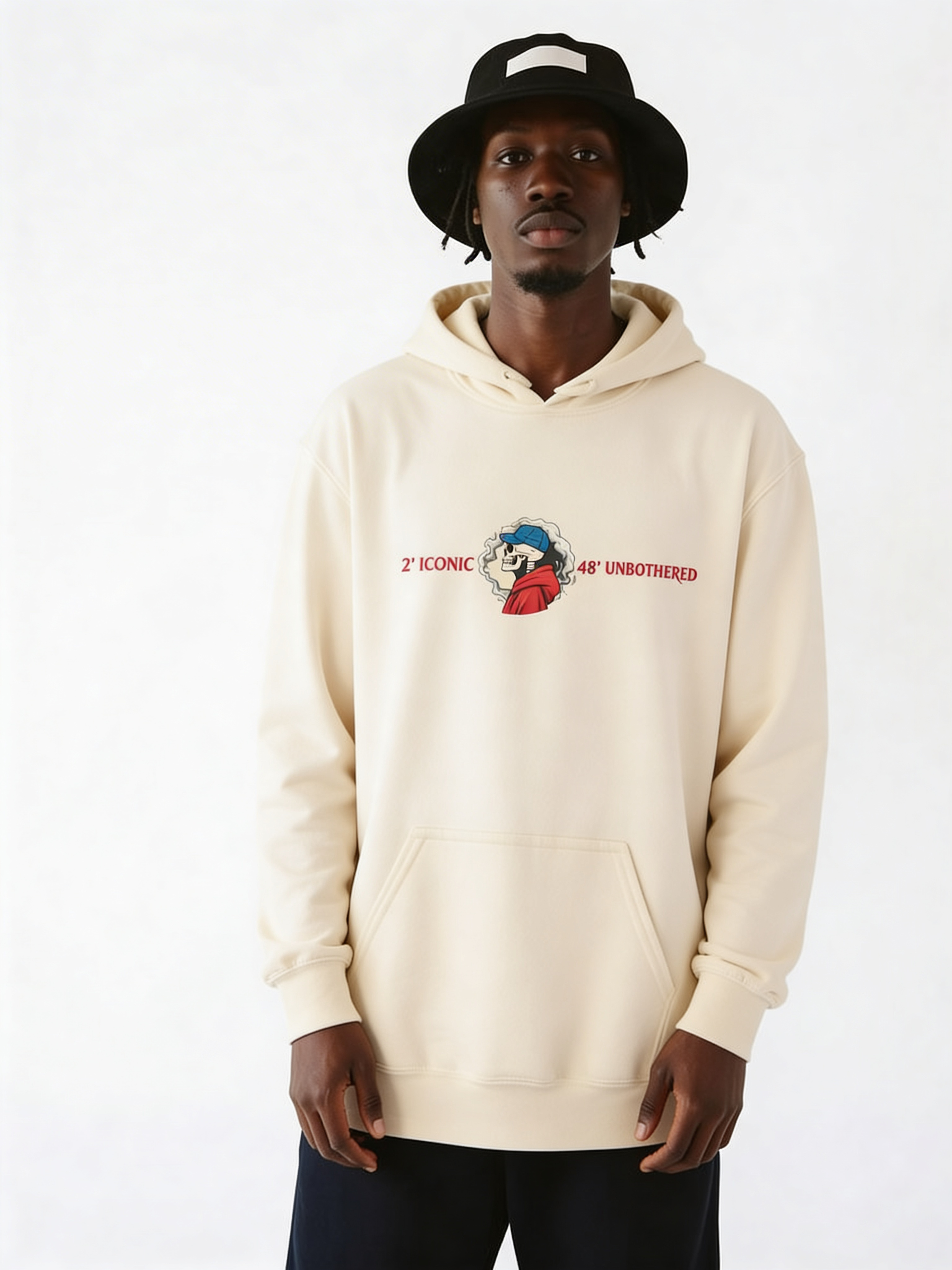 Male model modeling beige oversized graphic hoodie with minimal chest print, relaxed urban fashion style
