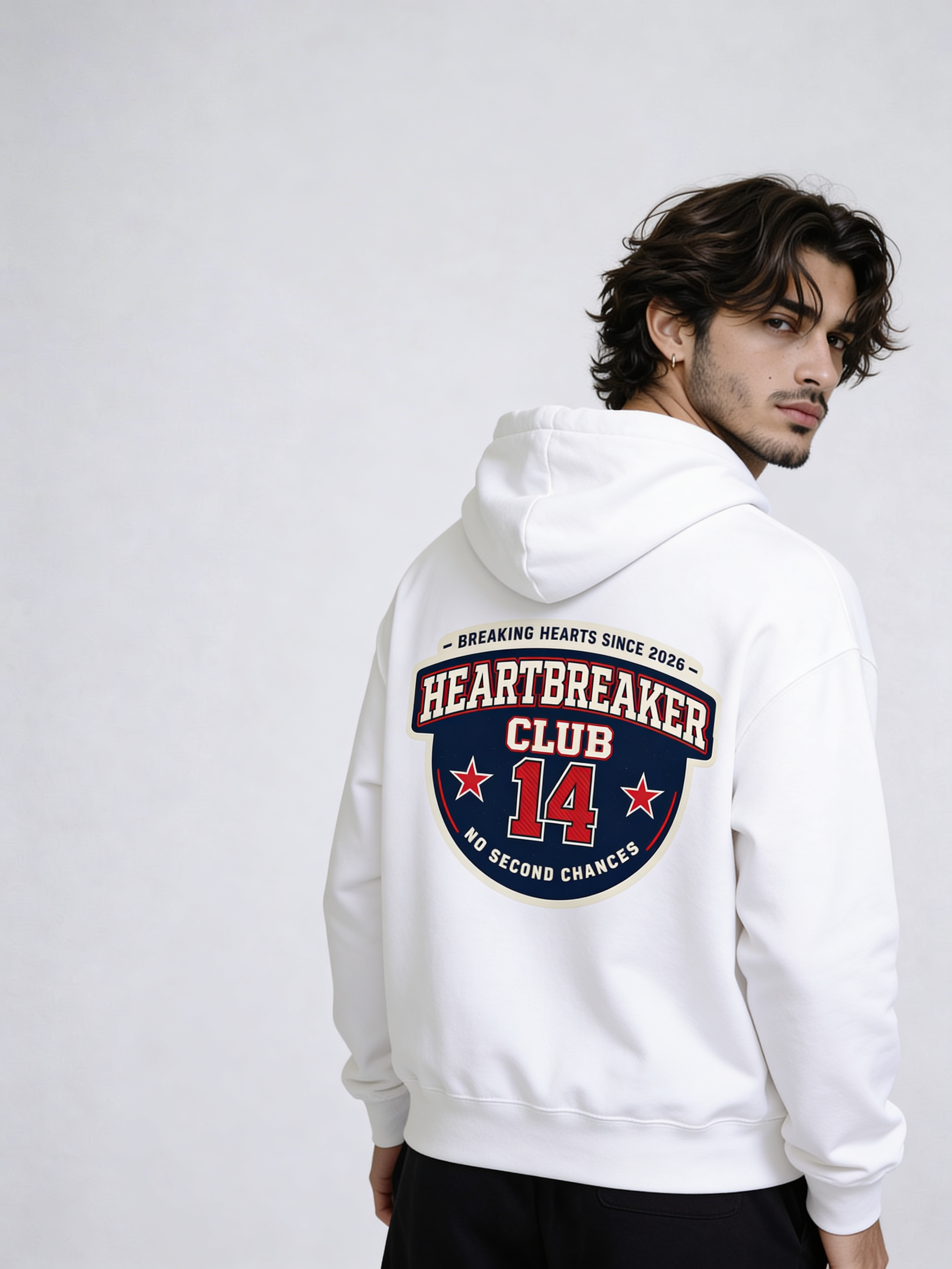 Noiré white oversized hoodie back view with large “Heartbreaker Club 14 – No Second Chances” varsity graphic, worn by male model, streetwear statement hoodie.