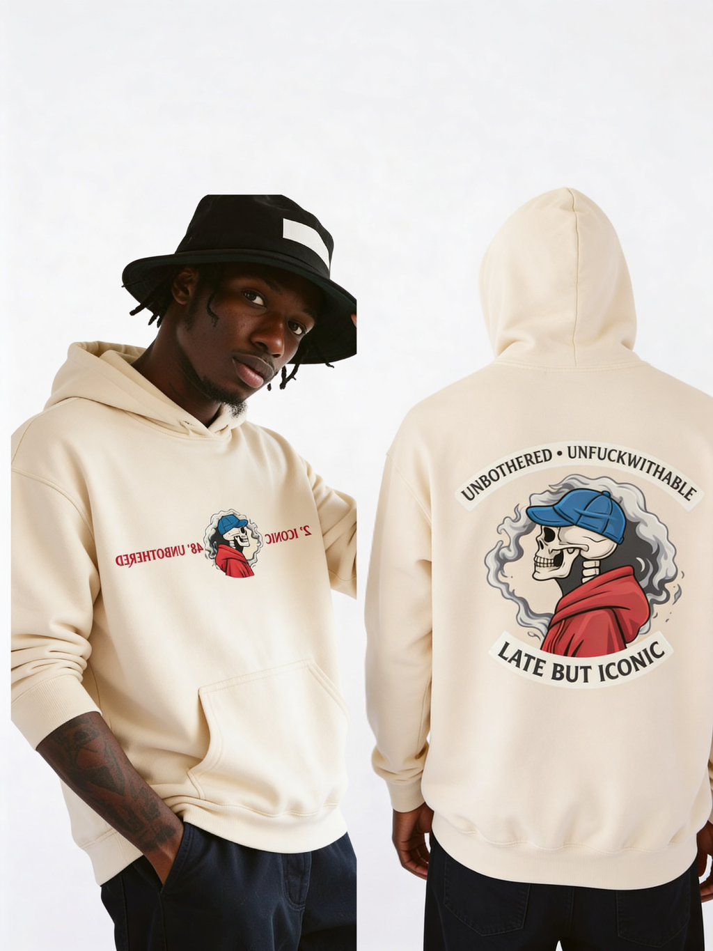 Male model wearing cream oversized streetwear hoodie with small skull chest logo on front and large illustrated skeleton graphic on back reading “Unbothered Unfuckwithable Late But Iconic”