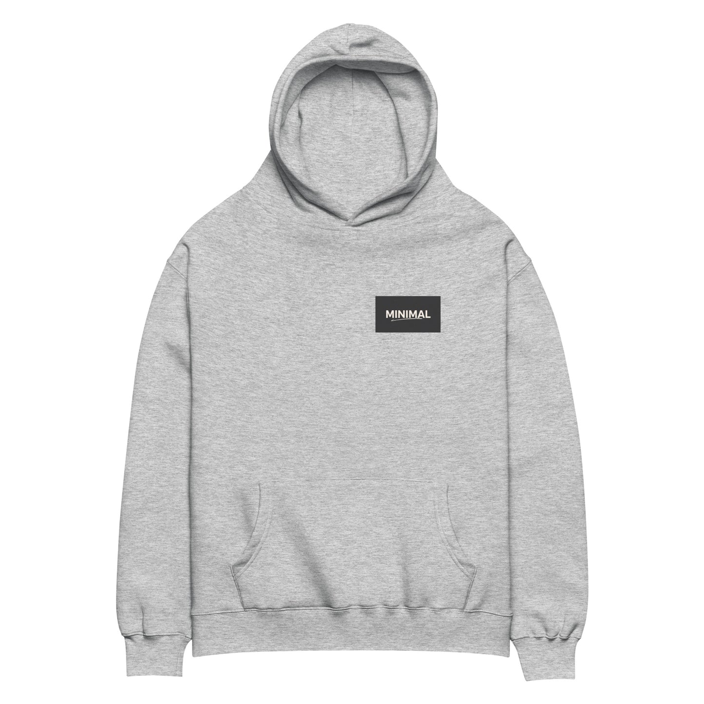 Oversized hoodie in medium grey with "Minimal But Never Basic" statement typography, front view
