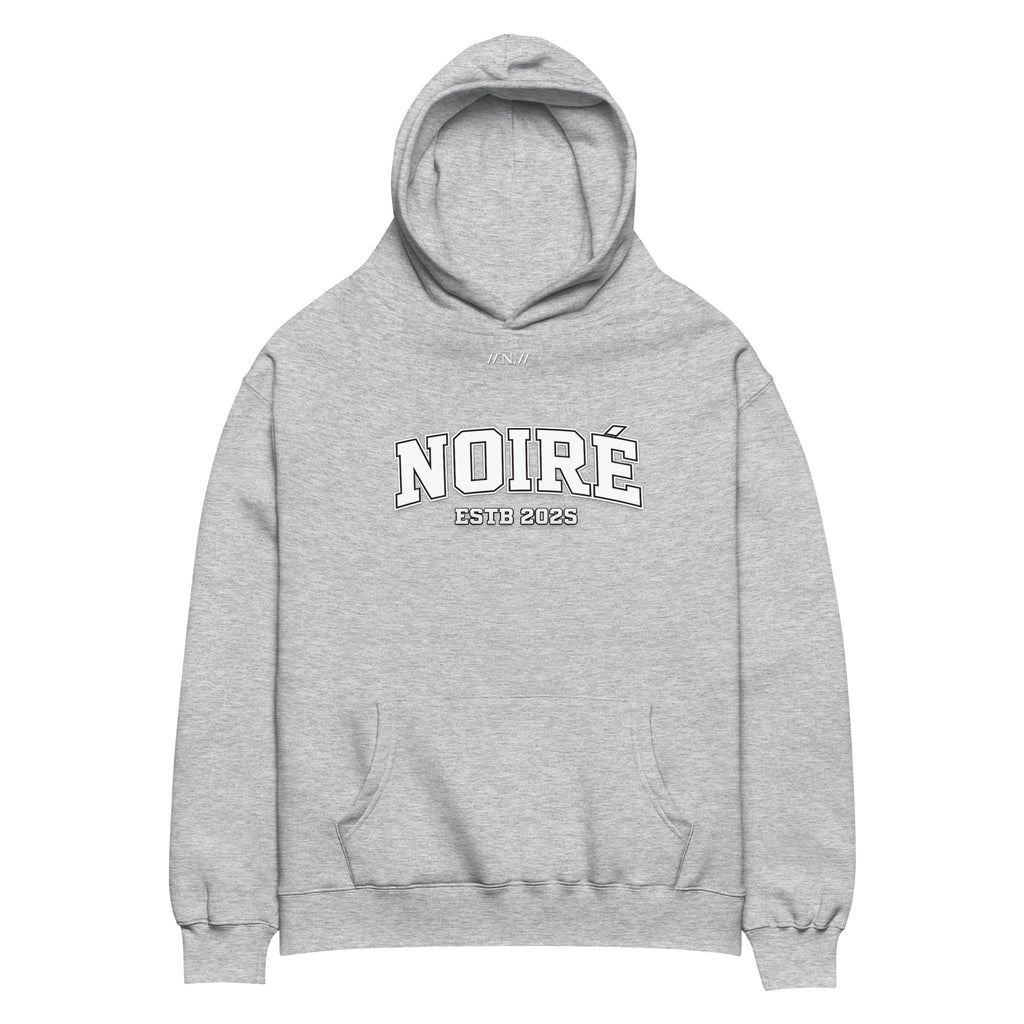 Grey oversized streetwear hoodie with Noiré logo print on chest, front view