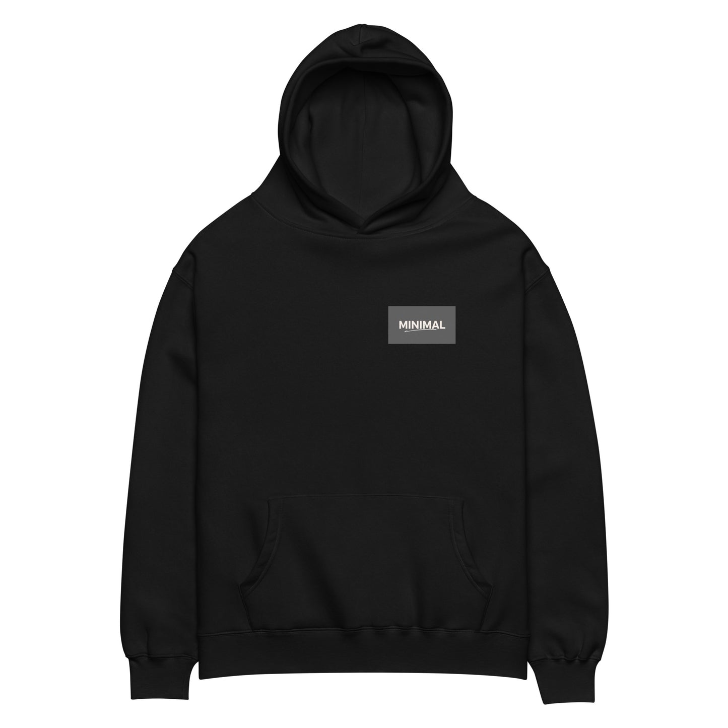 Oversized hoodie in black with "Minimal But Never Basic" statement typography, front view