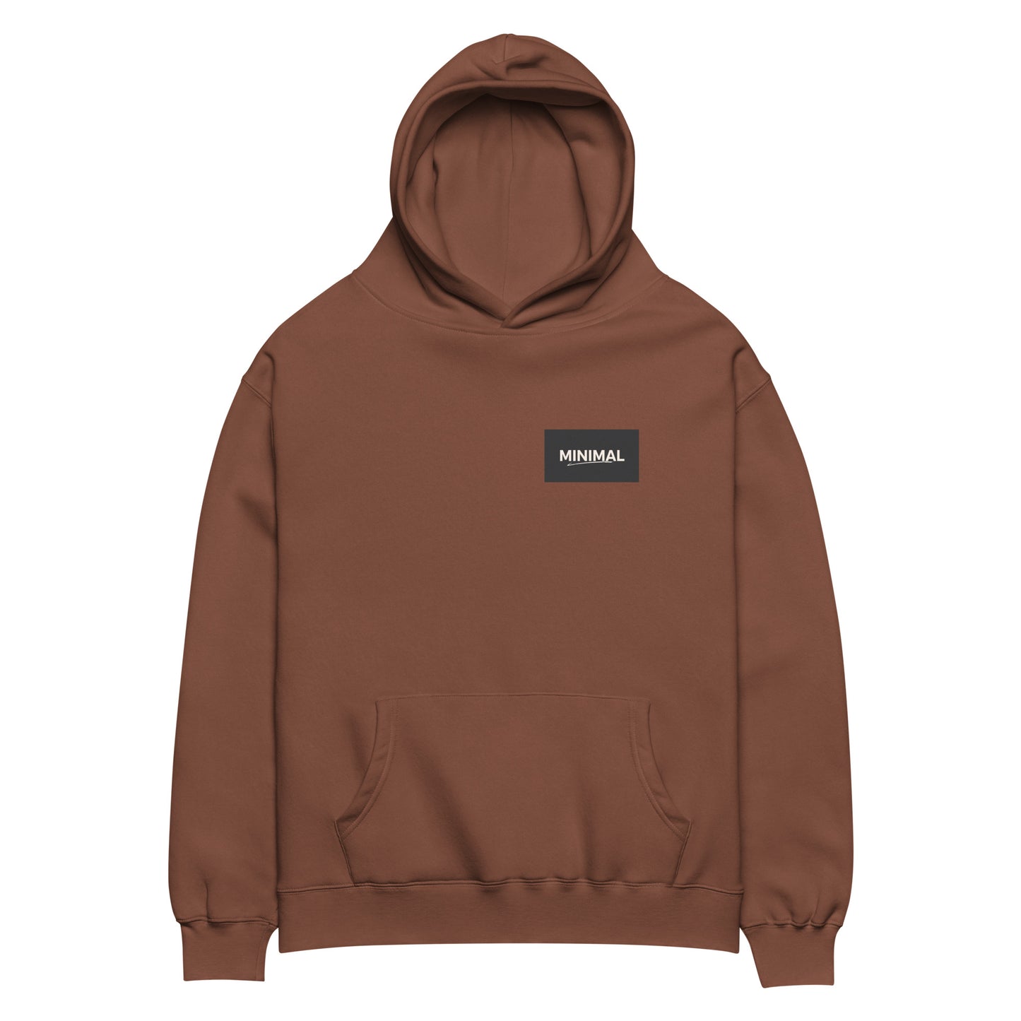 Oversized hoodie in brown with "Minimal But Never Basic" statement typography, front view