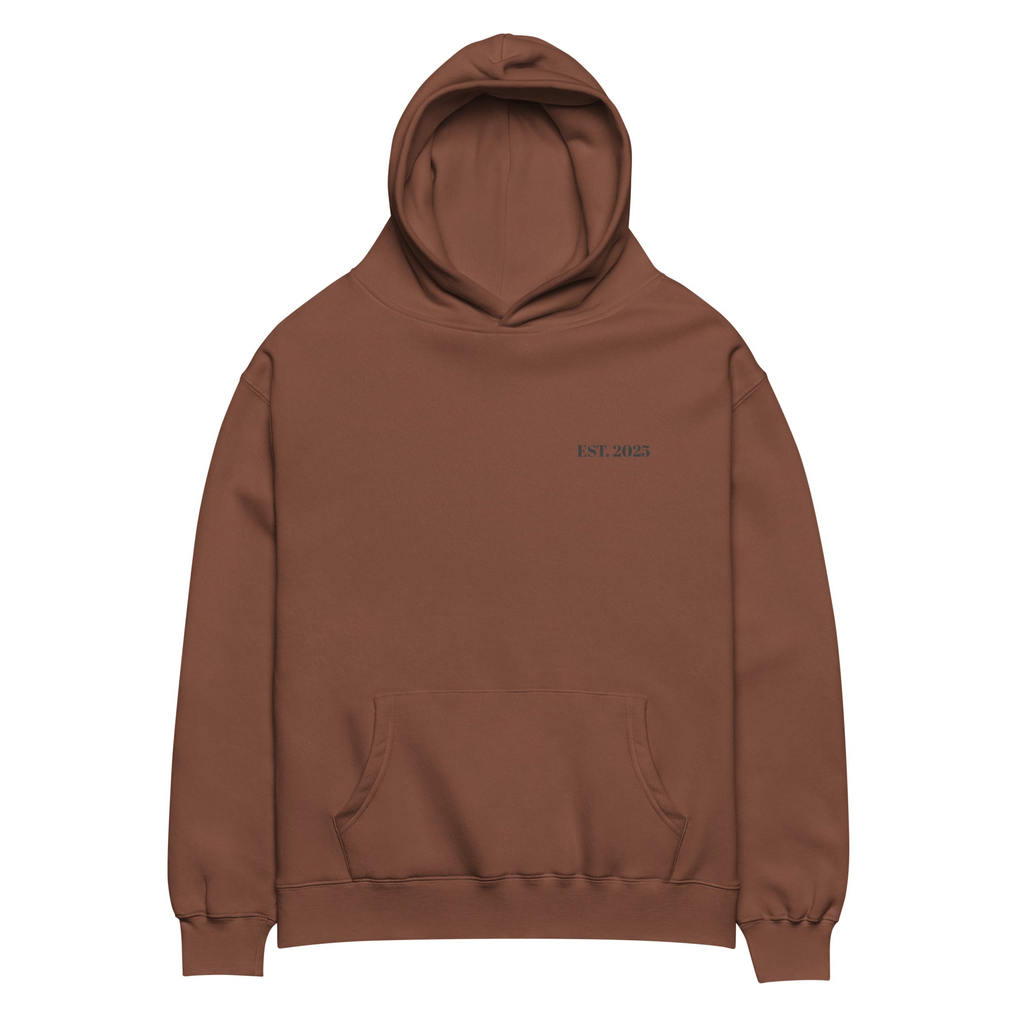Chestnut oversized unisex hoodie with minimalist front design, featuring subtle “EST. 2025” text on the chest, clean streetwear style and relaxed fit.