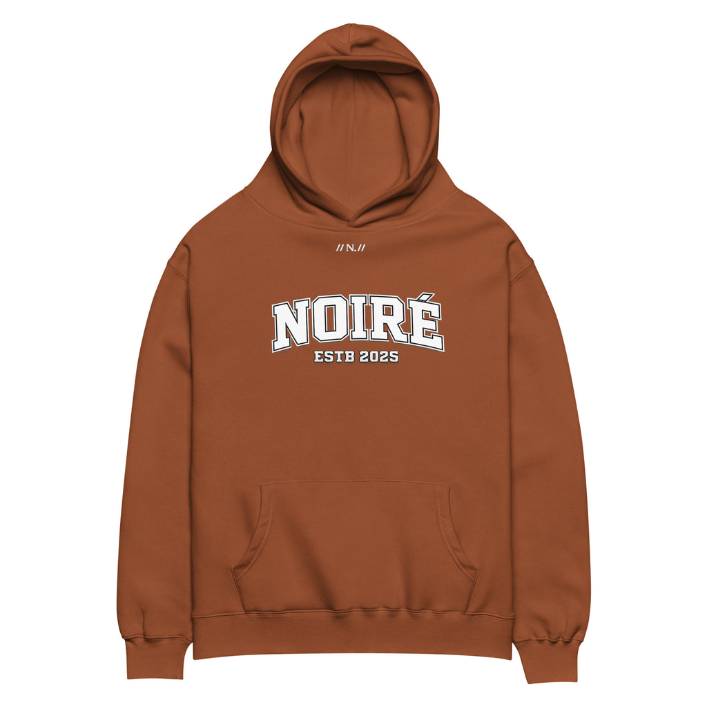 Brown oversized pullover hoodie with Noiré minimalist logo graphic, front view