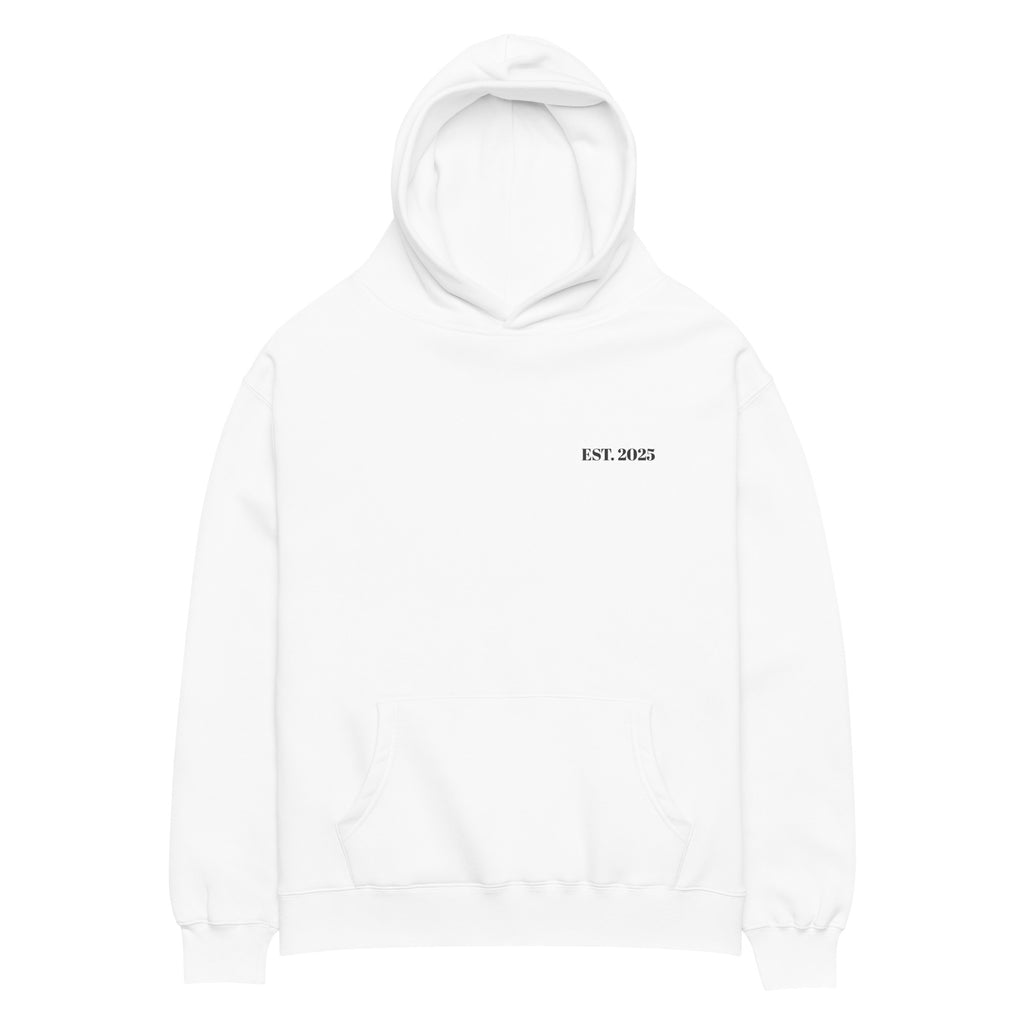 White oversized unisex hoodie with minimalist front design, featuring subtle “EST. 2025” text on the chest, clean streetwear style and relaxed fit.