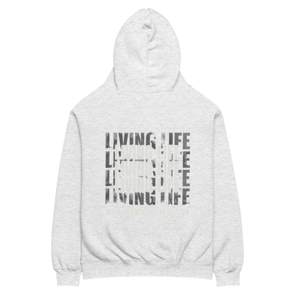 White heather oversized hoodie featuring repeated “Living Life” typography and the phrase “Living life with intentional rebellion” printed on the back.