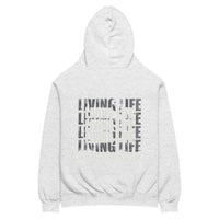 White heather oversized hoodie featuring repeated “Living Life” typography and the phrase “Living life with intentional rebellion” printed on the back.