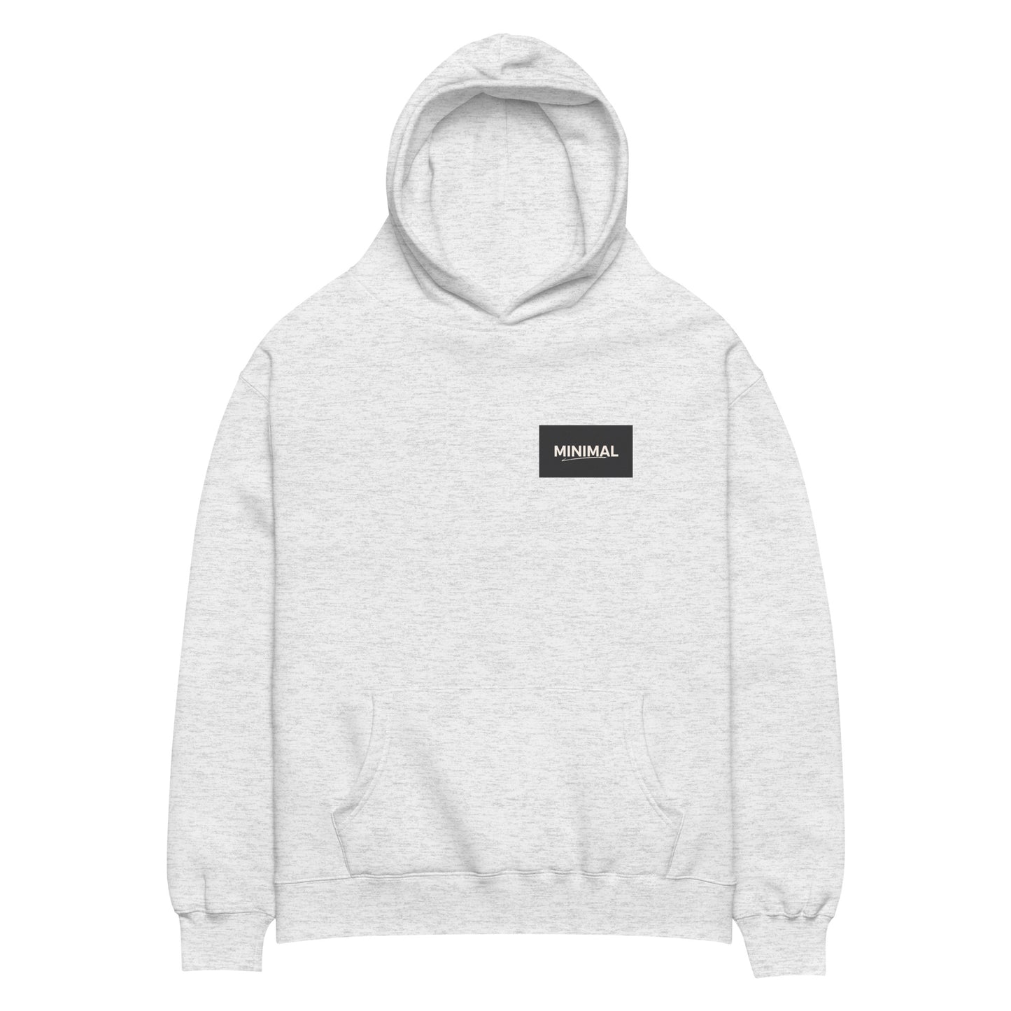 Oversized hoodie in light grey with "Minimal But Never Basic" statement typography, front view