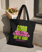 product outdoor lifestyle view black tote bag with flowers inside good taste cant be taught graphic streetwear