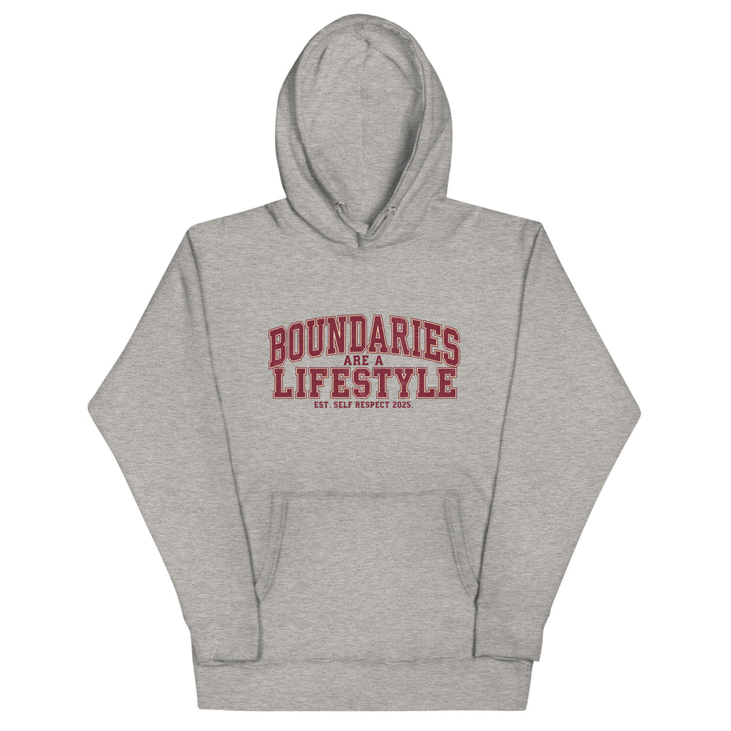 Carbon Gray unisex premium hoodie front view with “Boundaries Are a Lifestyle” text design