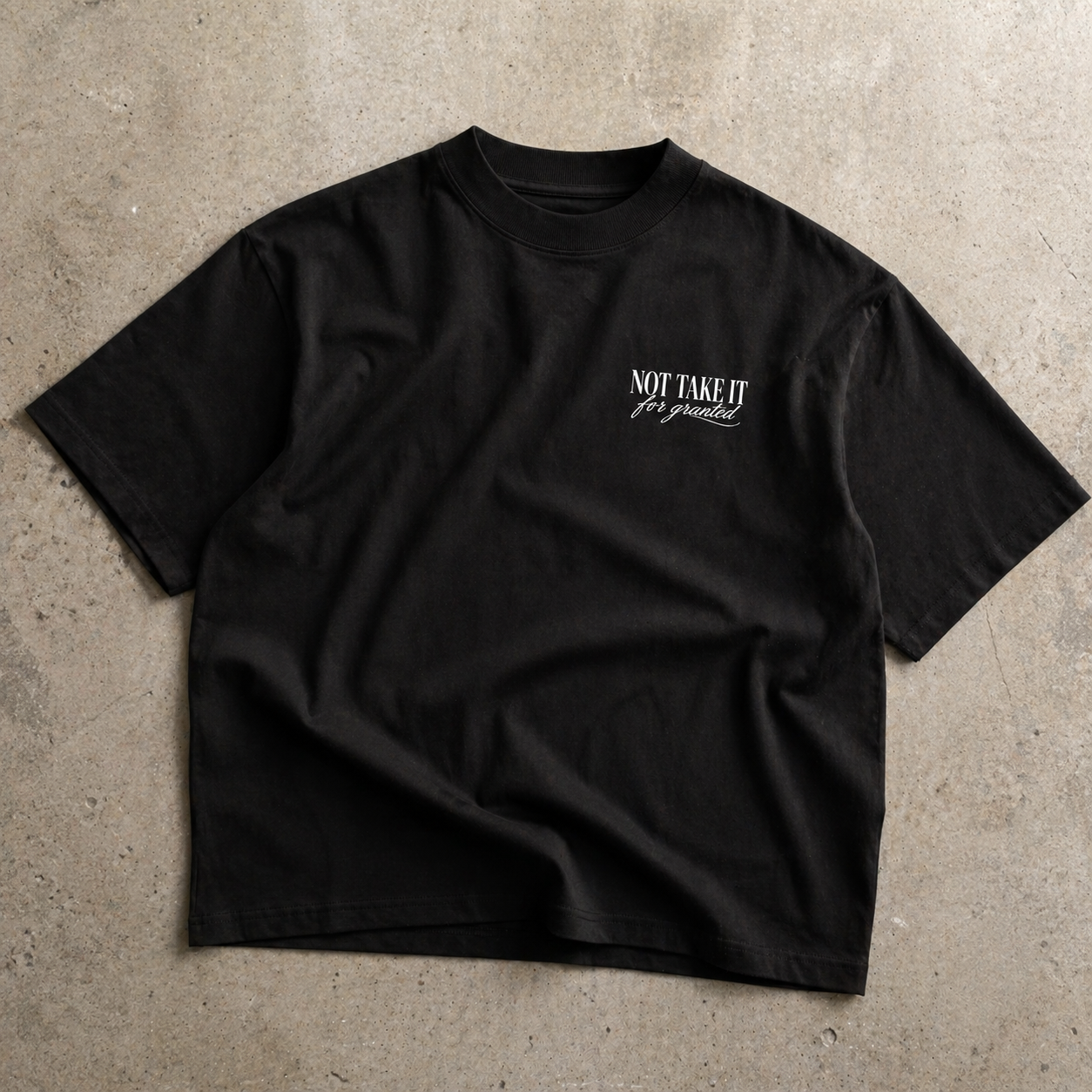 front view oversized black t-shirt minimalist chest logo streetwear fashion