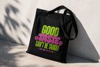 product angled view black tote bag shadow lighting good taste cant be taught typography graphic streetwear