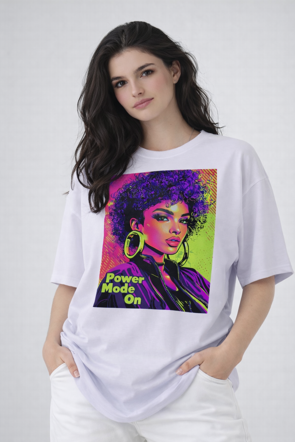 Female model wearing lilac oversized t-shirt with neon pop-art female portrait design, creative streetwear outfit by Noiré.