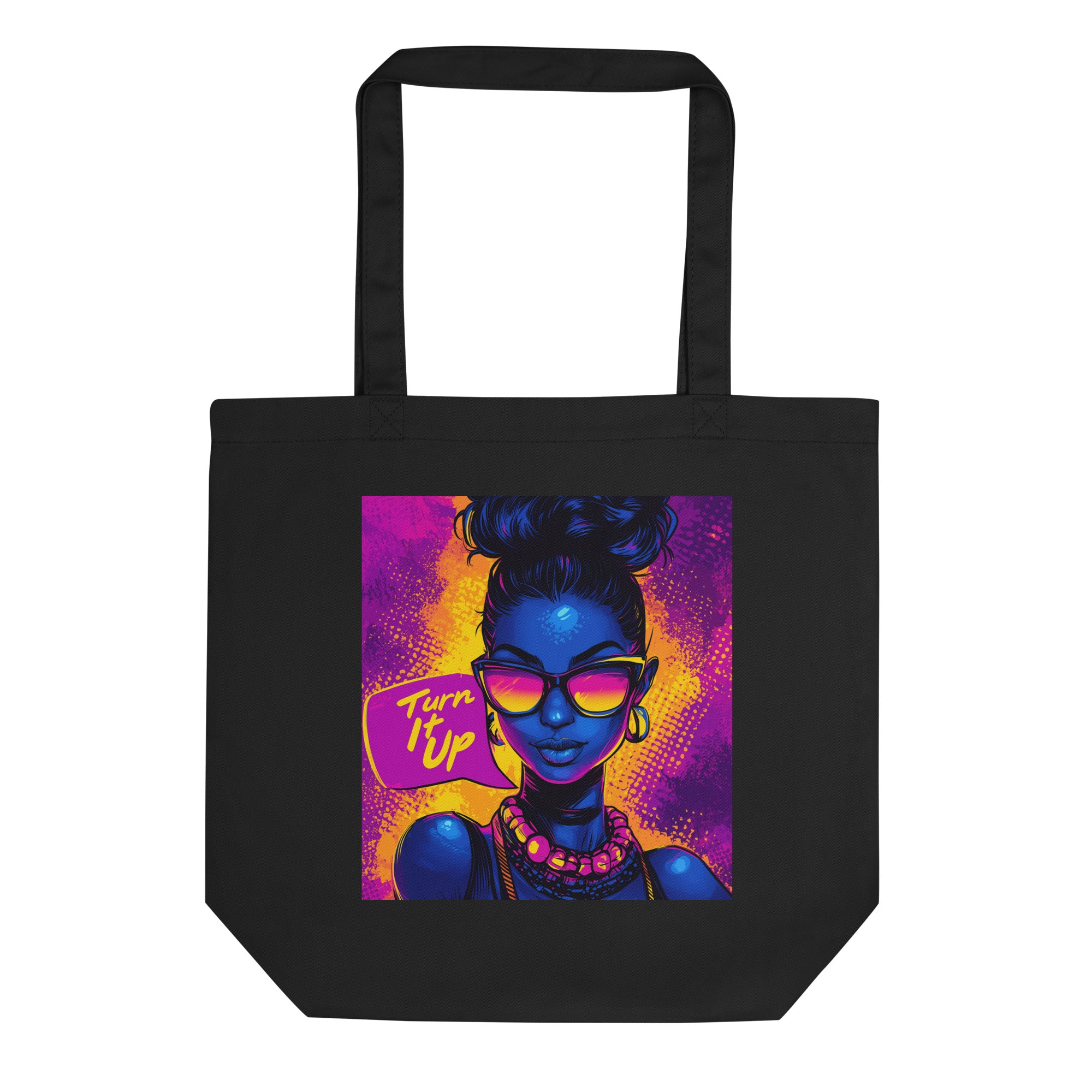 Black canvas tote bag with colorful female portrait graphic and “Turn It Up” text, unisex streetwear tote bag front view.