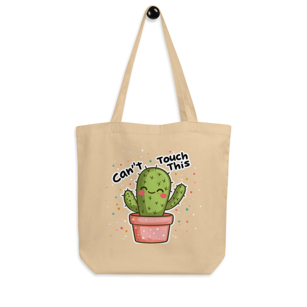 Natural canvas Nöiré cactus graphic tote bag, hanging product view