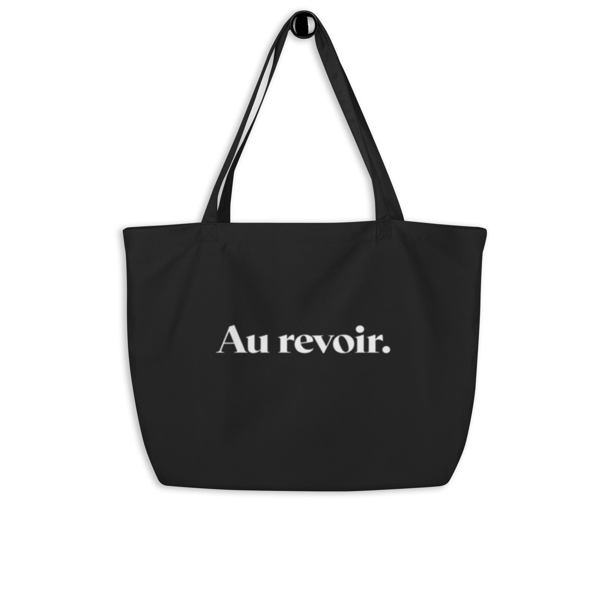 product hanging black tote bag au revoir typography design streetwear fashion