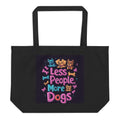 Reusable black tote bag featuring “Less People More Dogs” slogan and playful dog illustration, casual streetwear accessory