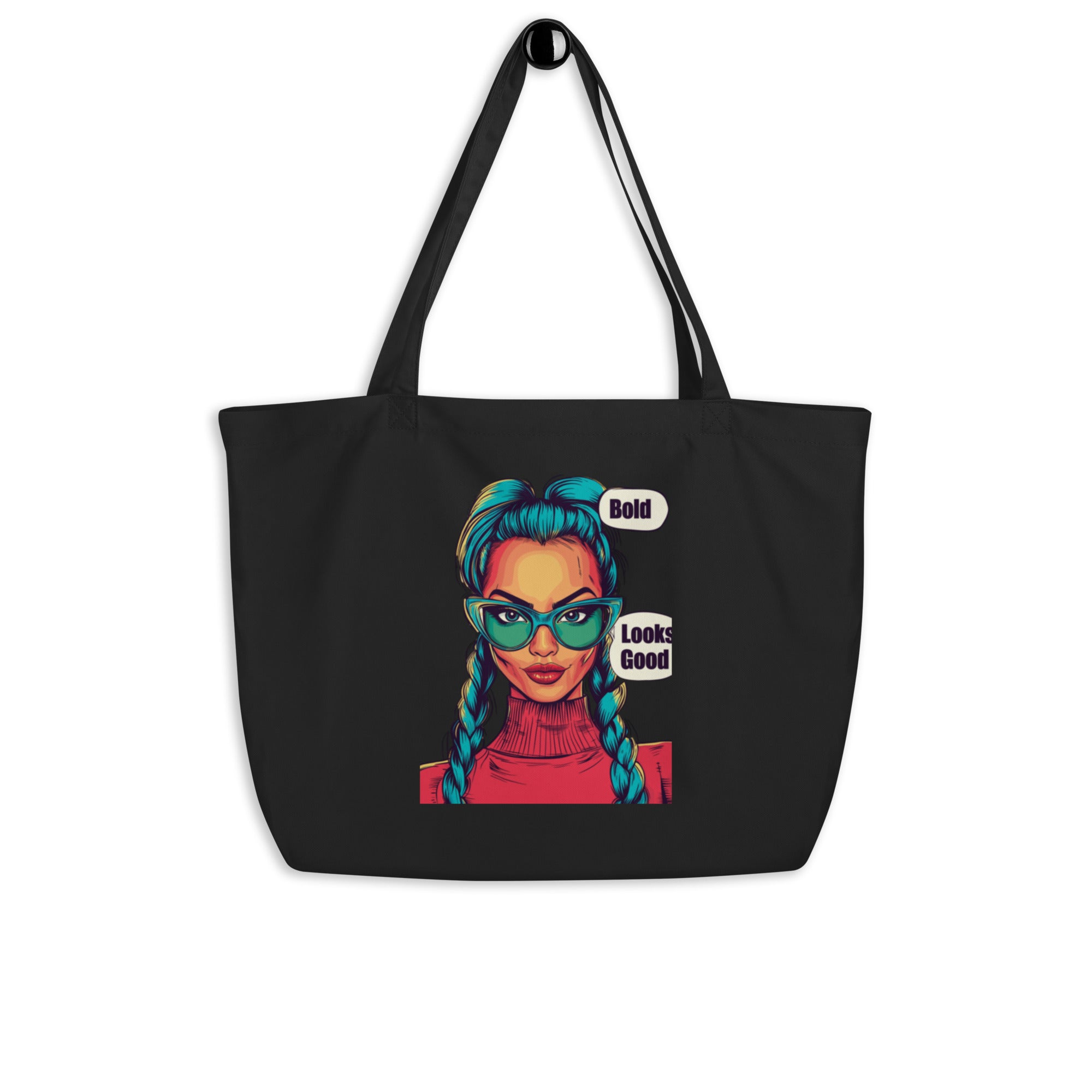Black canvas tote bag with colorful female portrait graphic and “Bold Looks Good” text, unisex streetwear tote bag front view.