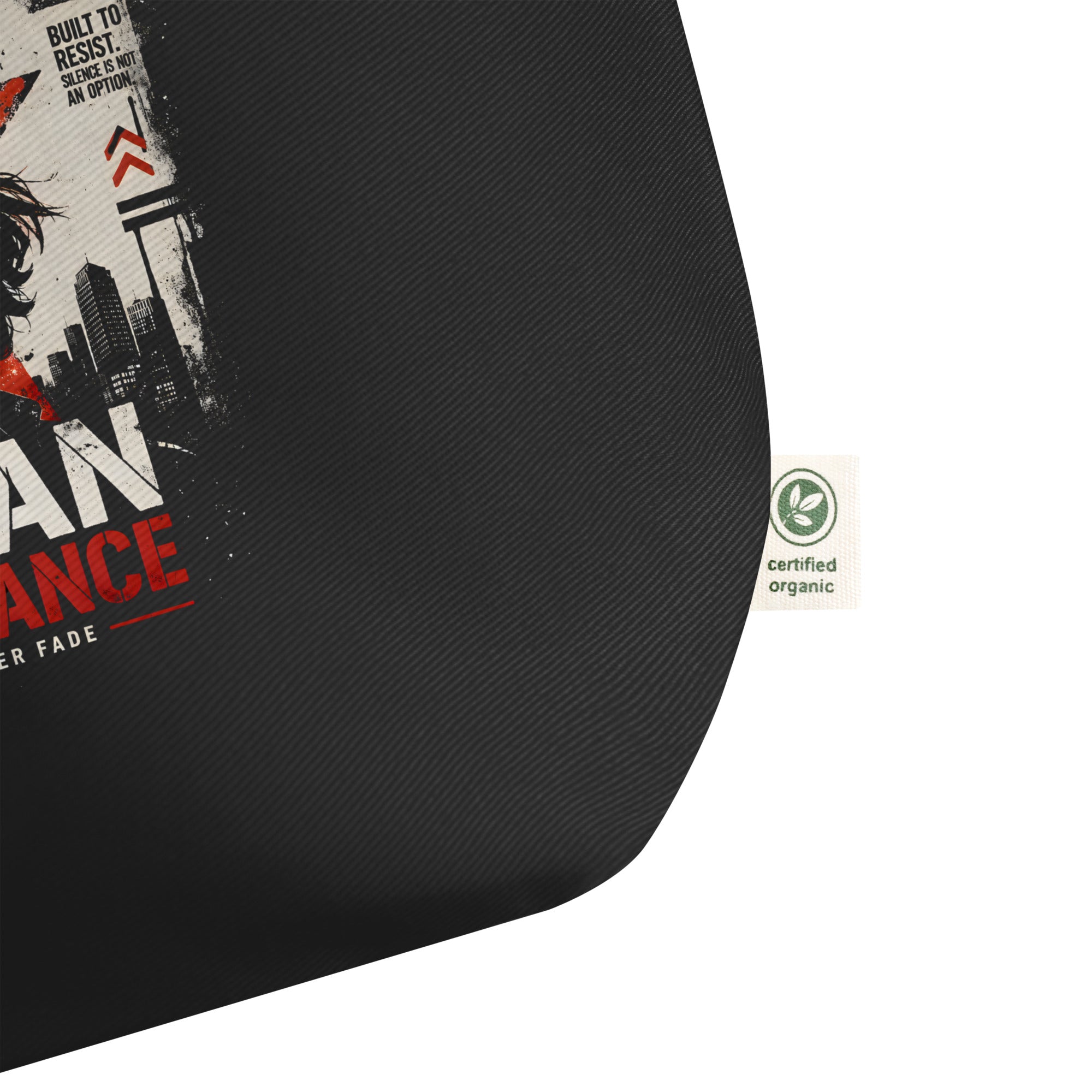 black tote bag close up fabric detail urban resistance print certified organic label streetwear accessory