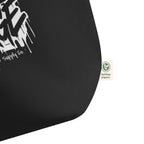 product close up view black tote bag fabric texture certified organic tag detail graphic streetwear
