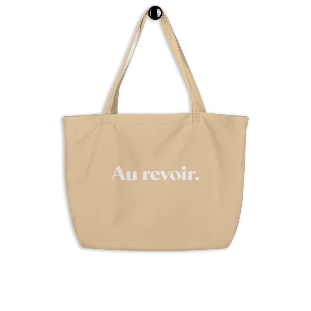 product back view beige tote bag au revoir typography design streetwear fashion