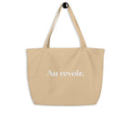 product back view beige tote bag au revoir typography design streetwear fashion