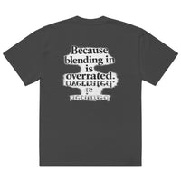 streetwear graphic t-shirt back view with “Because blending in is overrated” statement typography print
