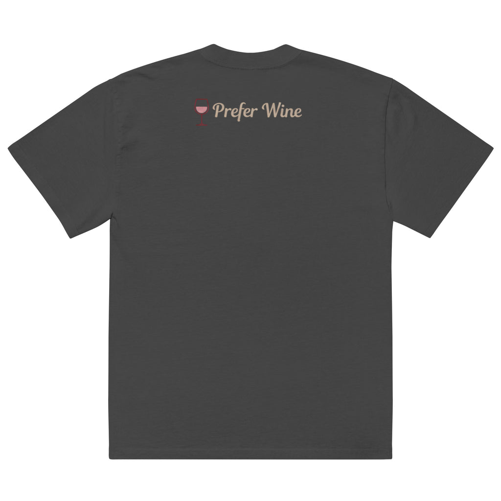 Back view of faded black t-shirt with small “Prefer Wine” text and wine glass icon printed on upper back near neckline in soft blush tones