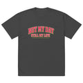 Black oversized t-shirt with red vintage typography print, front view – artistic streetwear by Noiré.