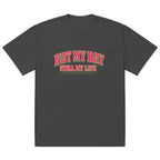 Black oversized t-shirt with red vintage typography print, front view – artistic streetwear by Noiré.