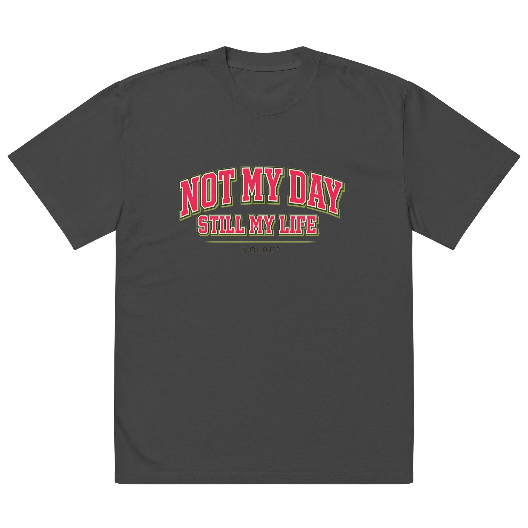 Black oversized t-shirt with red vintage typography print, front view – artistic streetwear by Noiré.