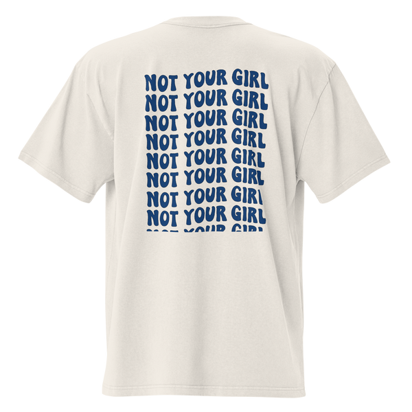Oversized faded bone unisex t-shirt back view with repeated “Not Your Girl” blue typography print