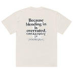 streetwear graphic t-shirt back view with “Because blending in is overrated” statement typography print
