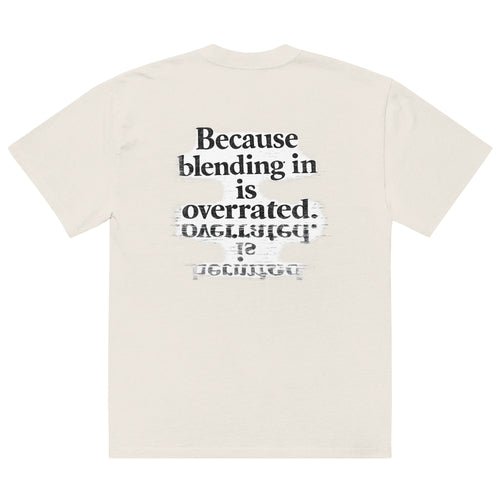 streetwear graphic t-shirt back view with “Because blending in is overrated” statement typography print
