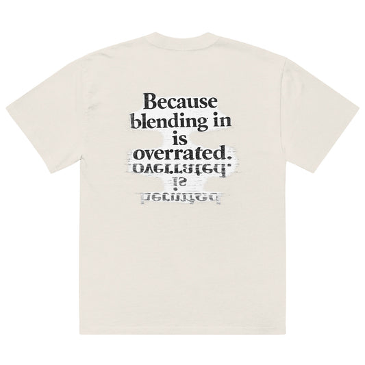 streetwear graphic t-shirt back view with “Because blending in is overrated” statement typography print
