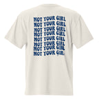 Oversized cream women’s statement t-shirt featuring repeated “Not Your Girl” navy text graphic on the back, bold streetwear fashion piece.