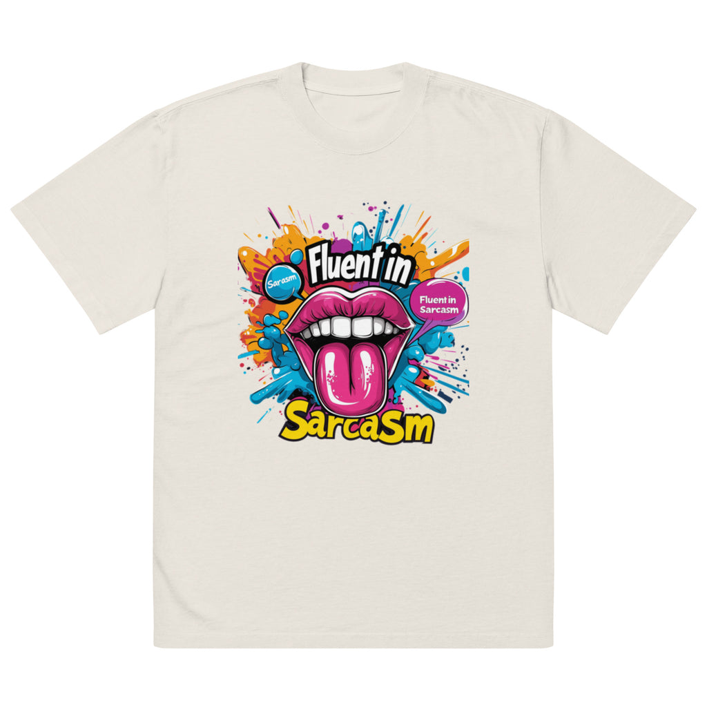 Oversized beige graphic t-shirt with vibrant “Fluent in Sarcasm” typography and pop art lips design in bright pink, blue, and yellow.