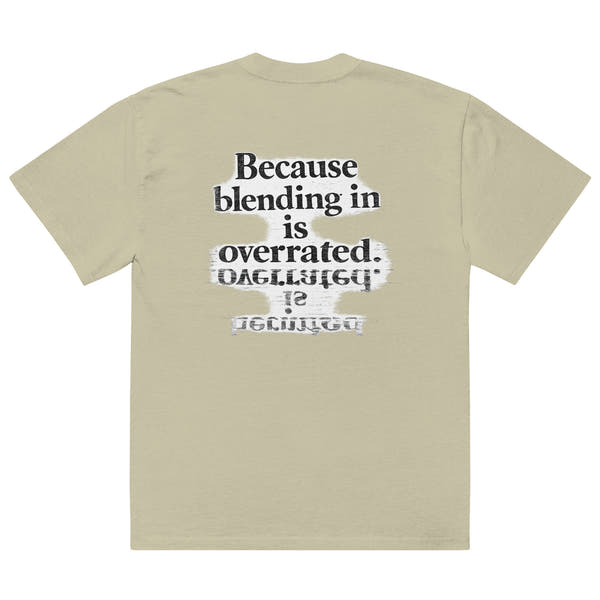 streetwear graphic t-shirt back view with “Because blending in is overrated” statement typography print
