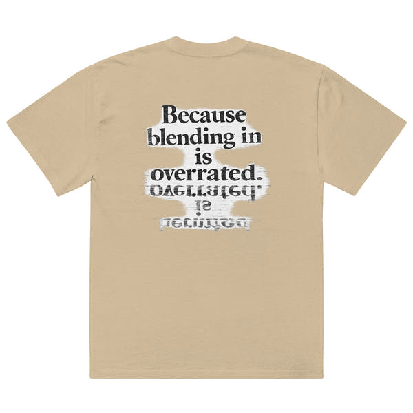 streetwear graphic t-shirt back view with “Because blending in is overrated” statement typography print
