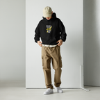 male model full body front view wearing oversized black streetwear hoodie with bold graphic print