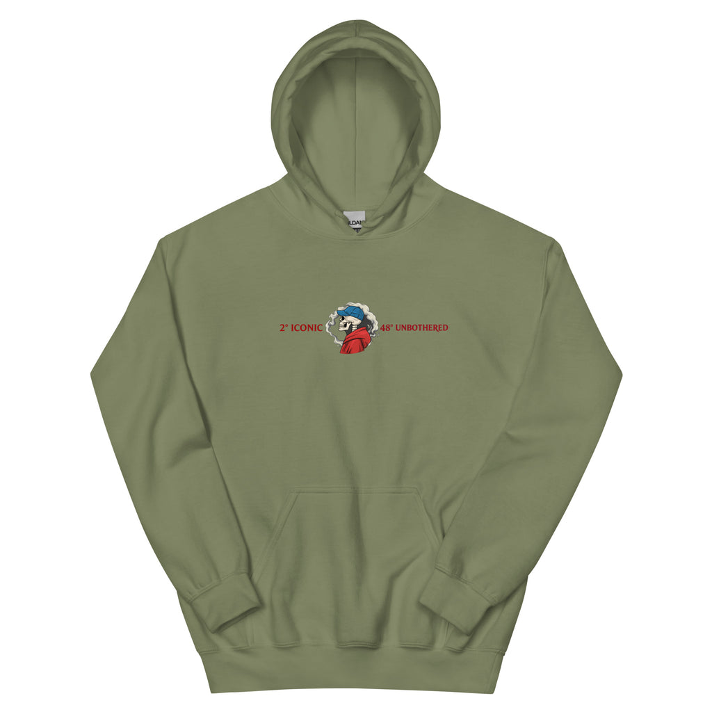 Military green oversized streetwear hoodie front view with small chest skull graphic and red “Iconic / Unbothered” text print, neutral background.