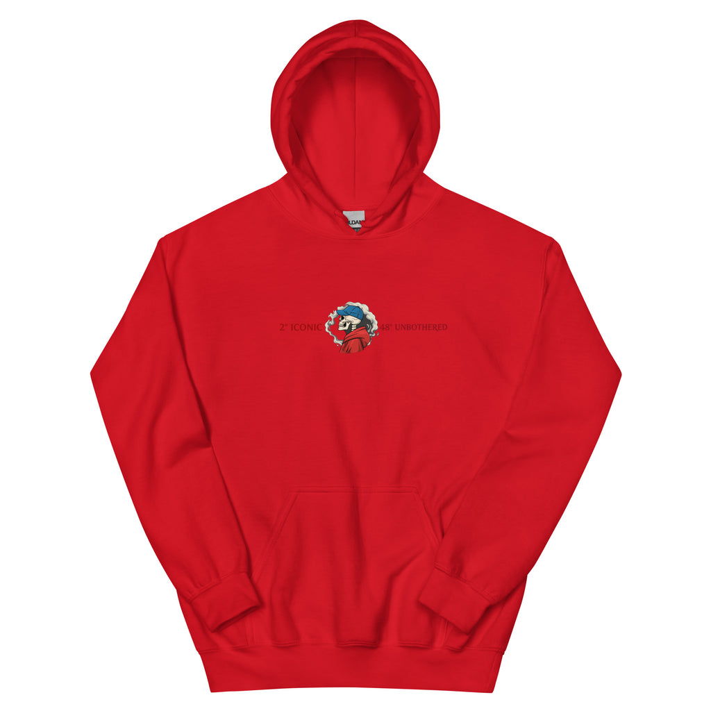 Red oversized streetwear hoodie front view with small chest skull graphic and red “Iconic / Unbothered” text print, neutral background.