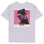 Lavender oversized t-shirt with retro glitch aesthetic portrait of woman wearing sunglasses and “Too cute to care” slogan graphic, urban streetwear design