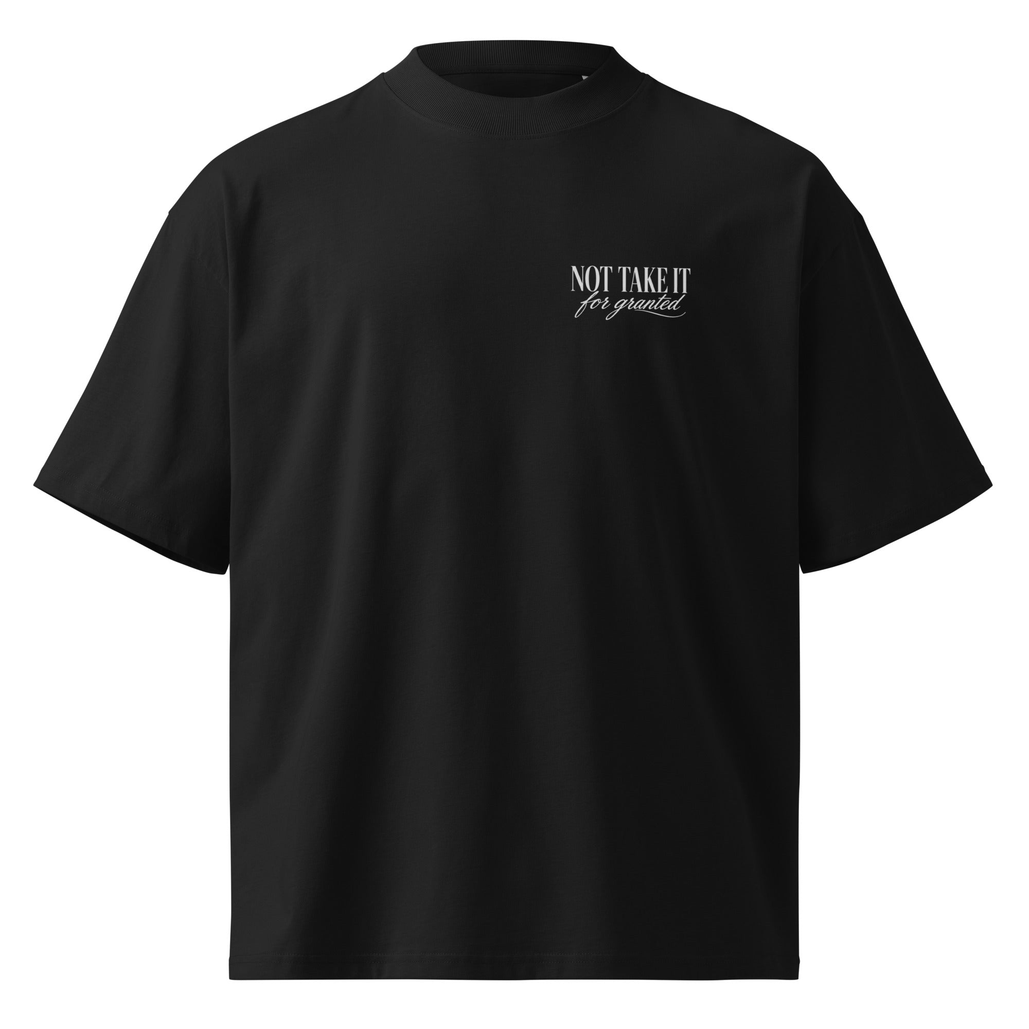 Front view oversized black minimalist logo t-shirt subtle chest print streetwear essential