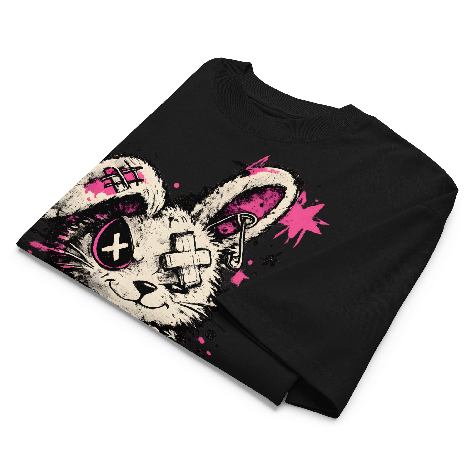 flat lay folded oversized black graphic streetwear t shirt punk rabbit graffiti design urban streetwear clothing